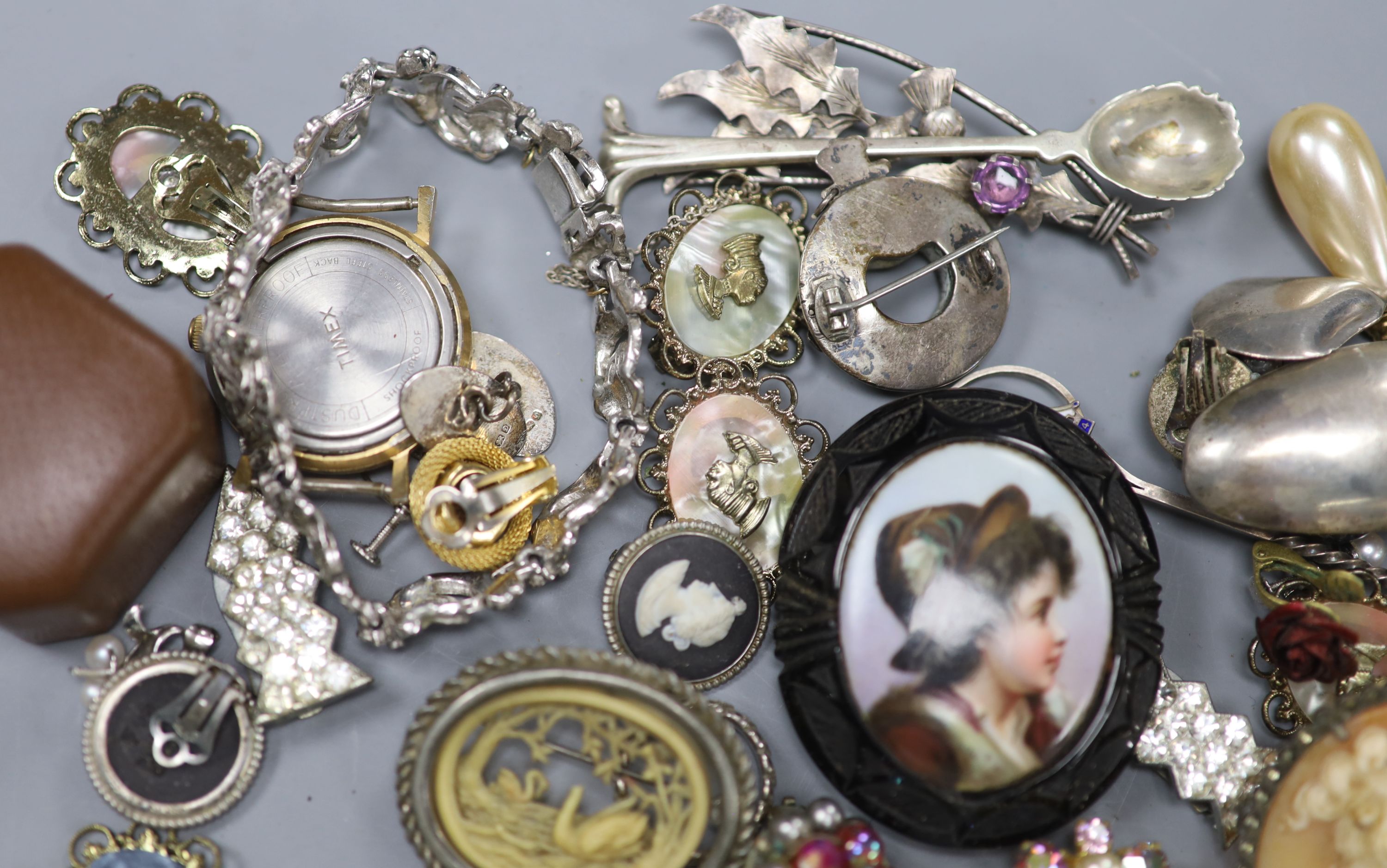 A small group of assorted costume jewellery and other items including silver teaspoons and Timex wrist watch.